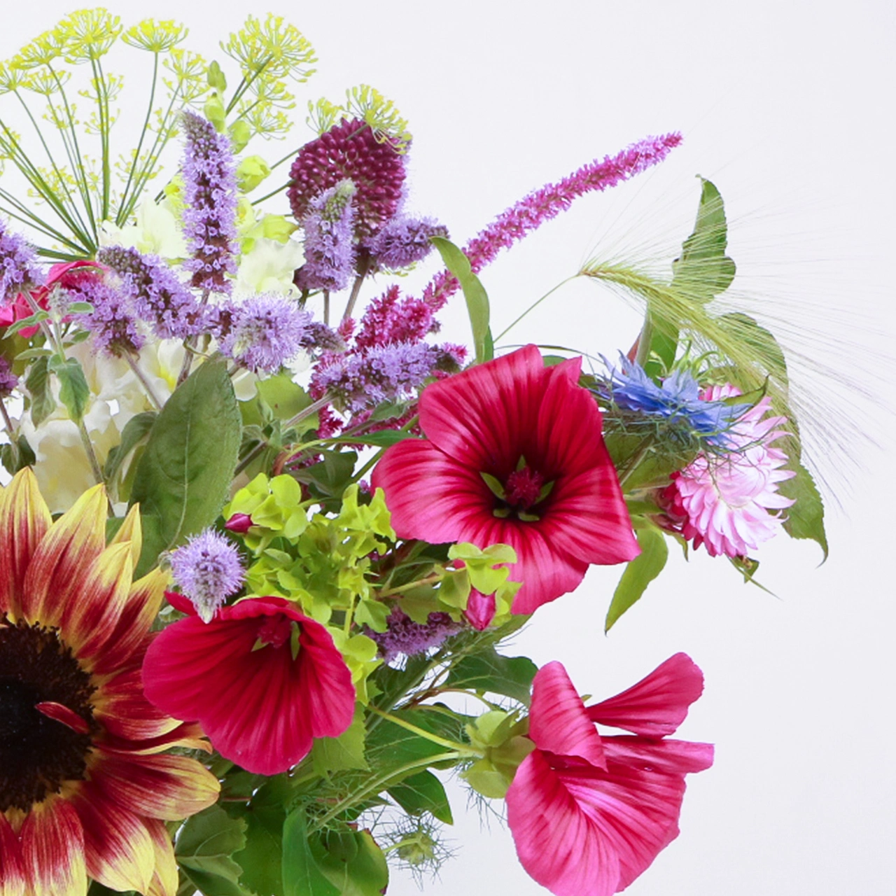 Close-up right side of large seasonal bouquet showing bright pink cosmos, purple veronica spikes, yellow dill flowers, and love-in-a-mist foliage